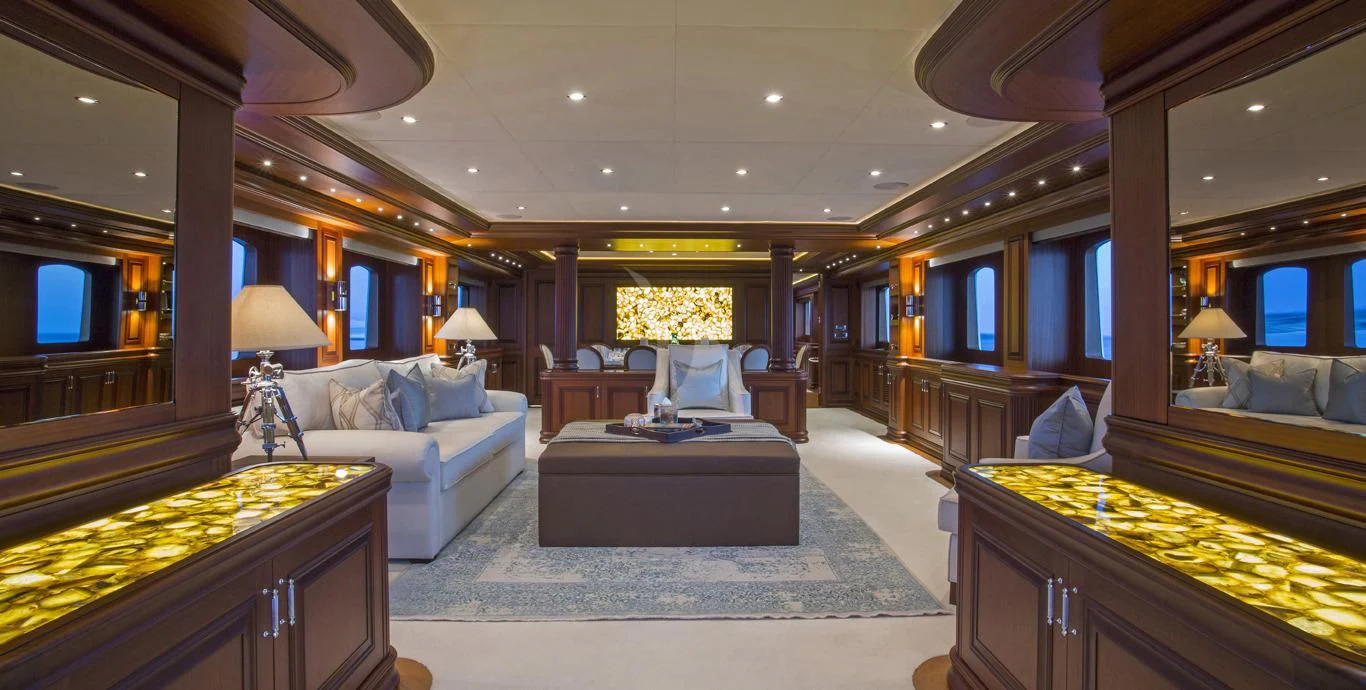 a room with a bed and a couch aboard OMNIA 1 Yacht for Sale