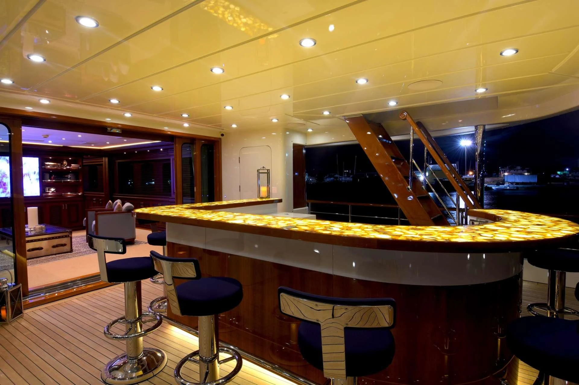 a room with a table and chairs aboard OMNIA 1 Yacht for Sale