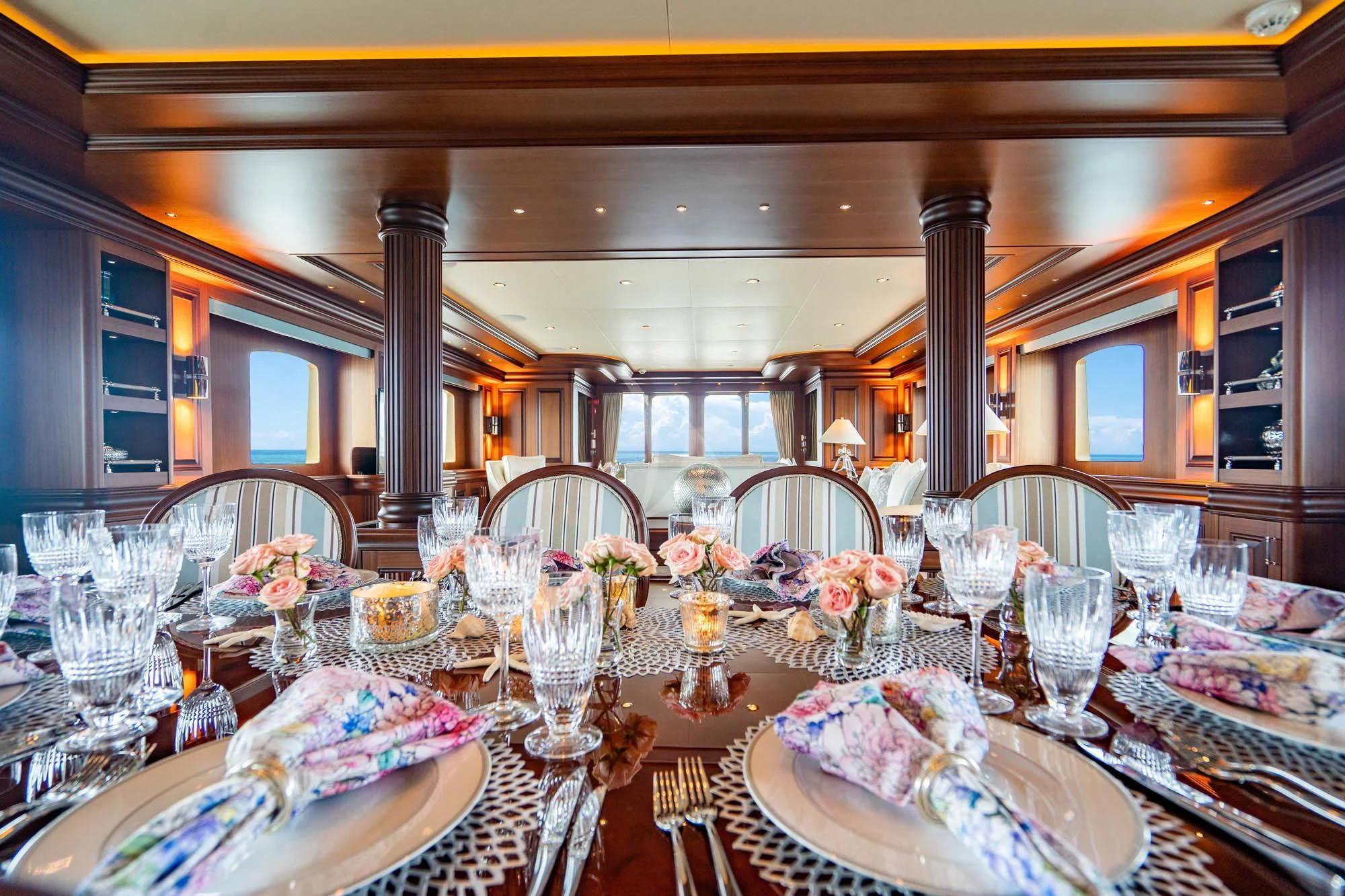 a table set for a dinner aboard OMNIA 1 Yacht for Sale
