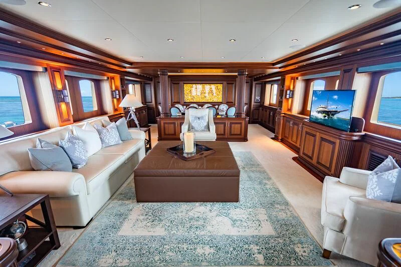 a living room with a large window aboard OMNIA 1 Yacht for Sale