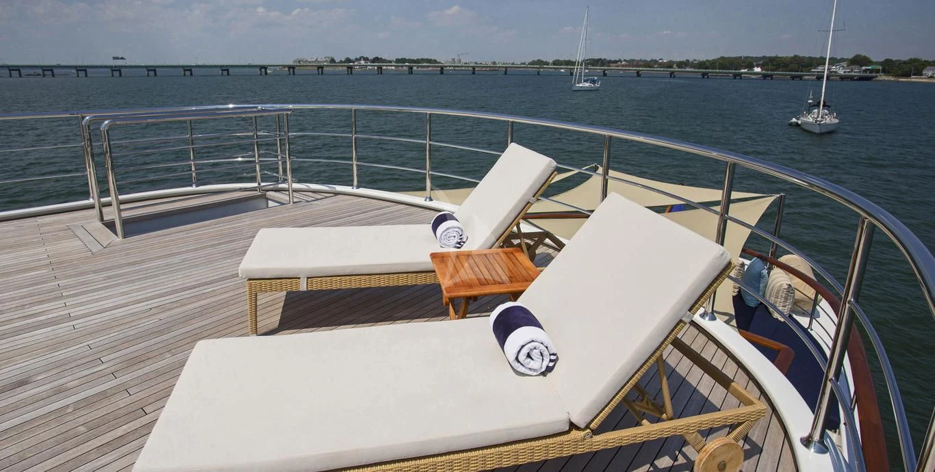 a boat on a dock aboard OMNIA 1 Yacht for Sale