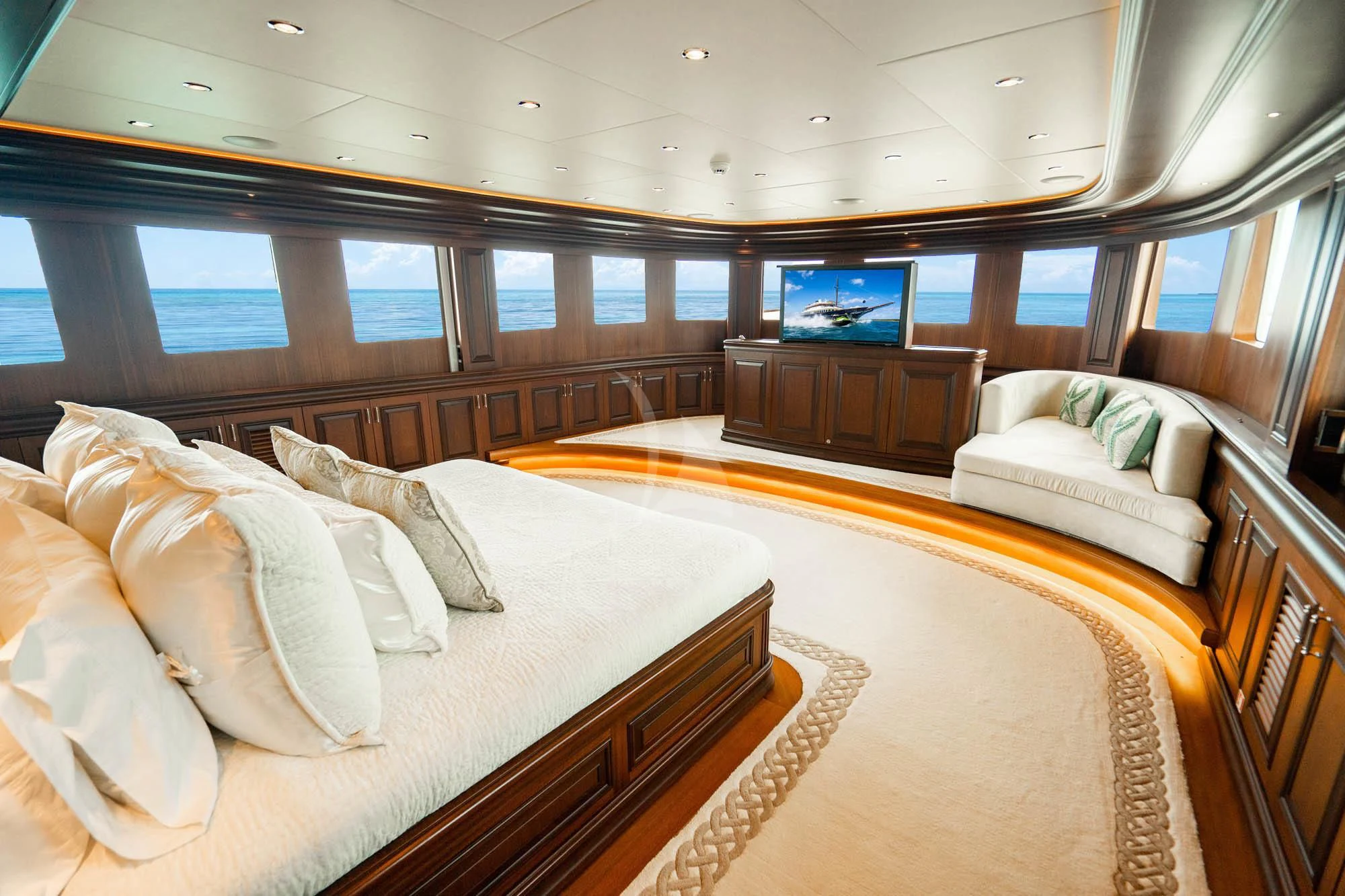 a room with a bed and a tv aboard OMNIA 1 Yacht for Sale