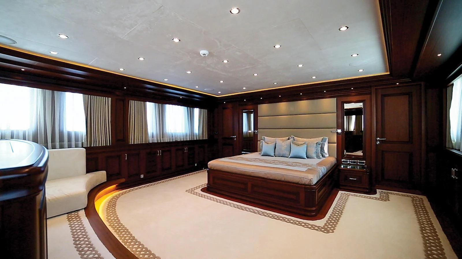 a large bedroom with a large bed aboard OMNIA 1 Yacht for Sale