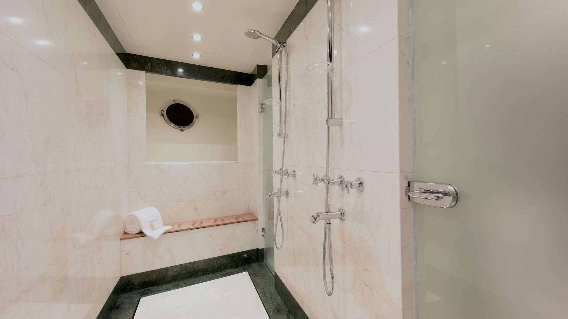 a bathroom with a shower aboard OMNIA 1 Yacht for Sale
