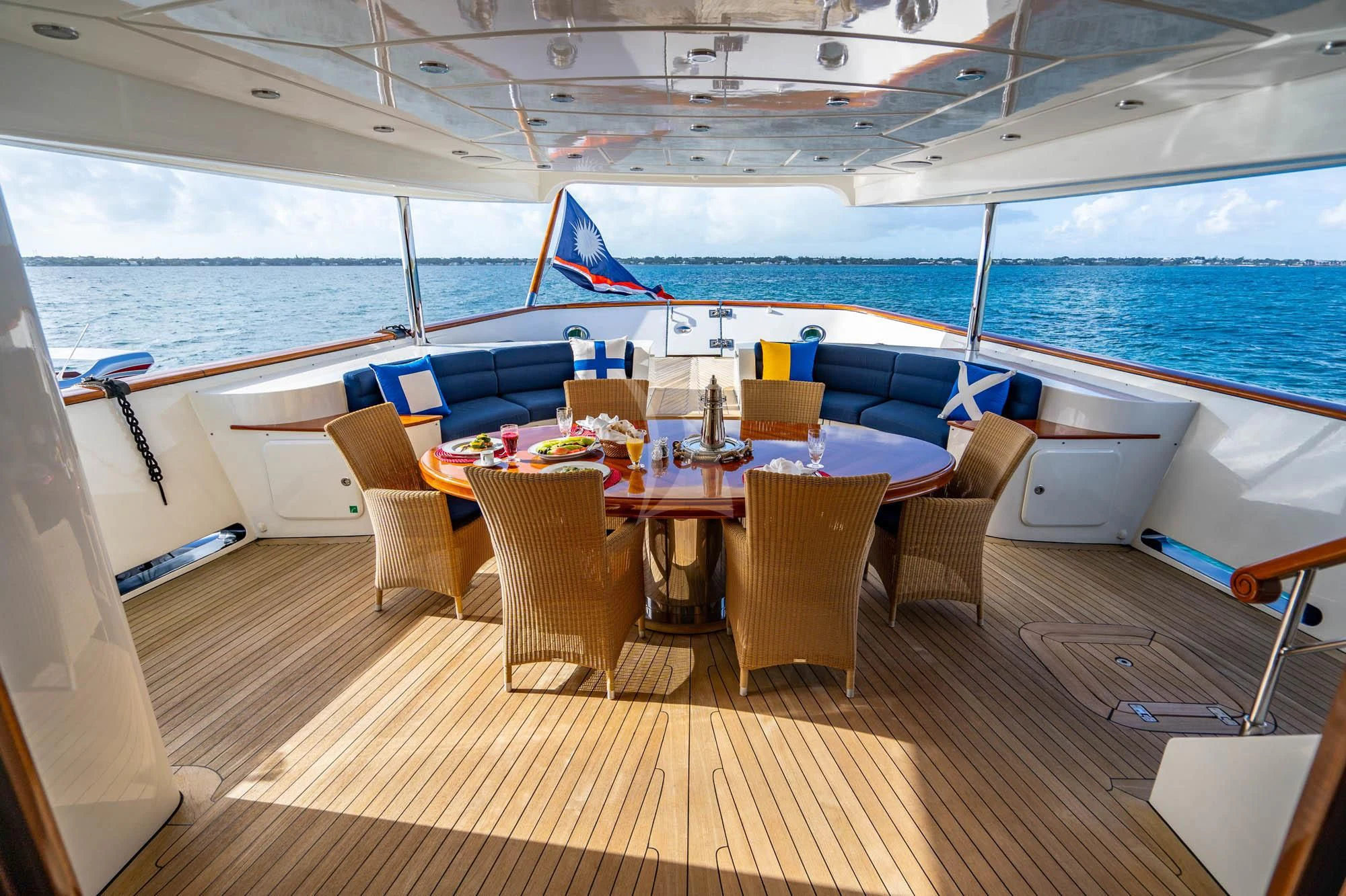 a room with a table and chairs aboard OMNIA 1 Yacht for Sale