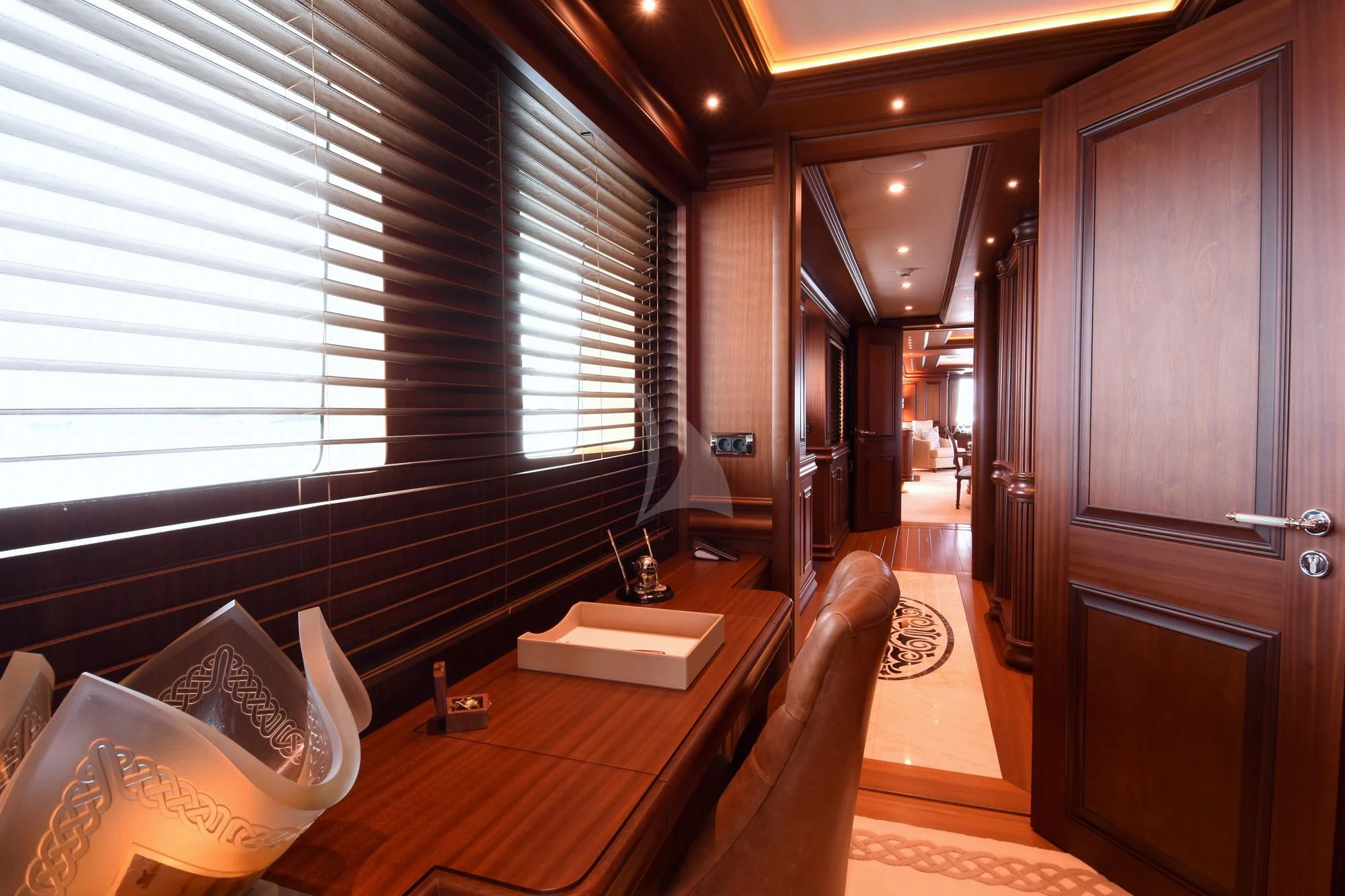 a room with a desk and a chair aboard OMNIA 1 Yacht for Sale