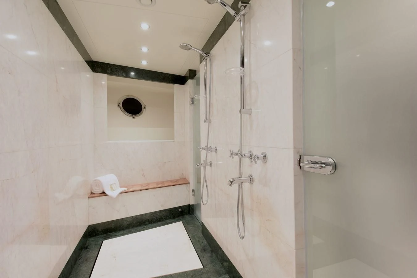 a bathroom with a shower and a sink aboard OMNIA 1 Yacht for Sale
