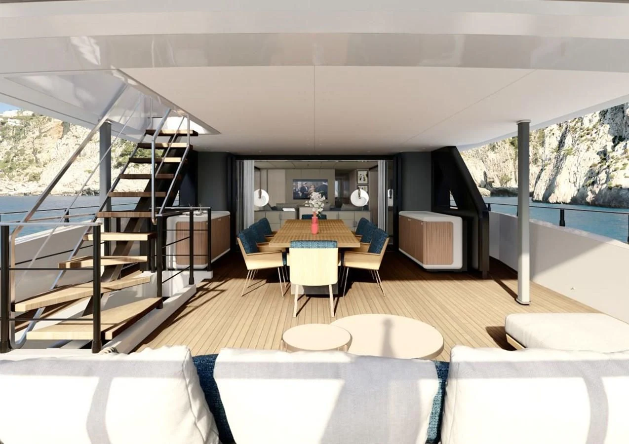 a room with a table and chairs aboard HORIZON Yacht for Sale