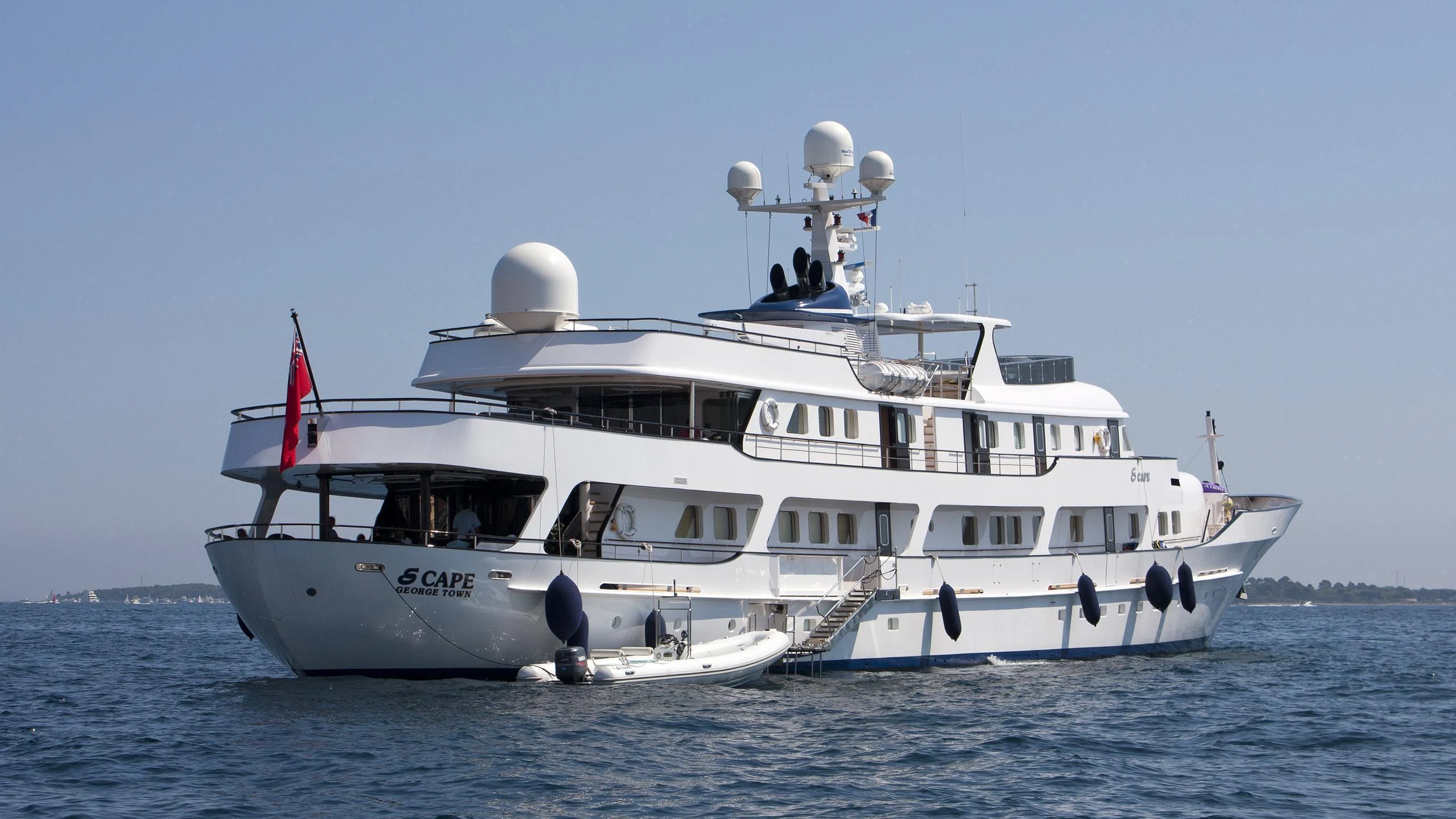 a white boat on the water aboard MESERRET II Yacht for Sale