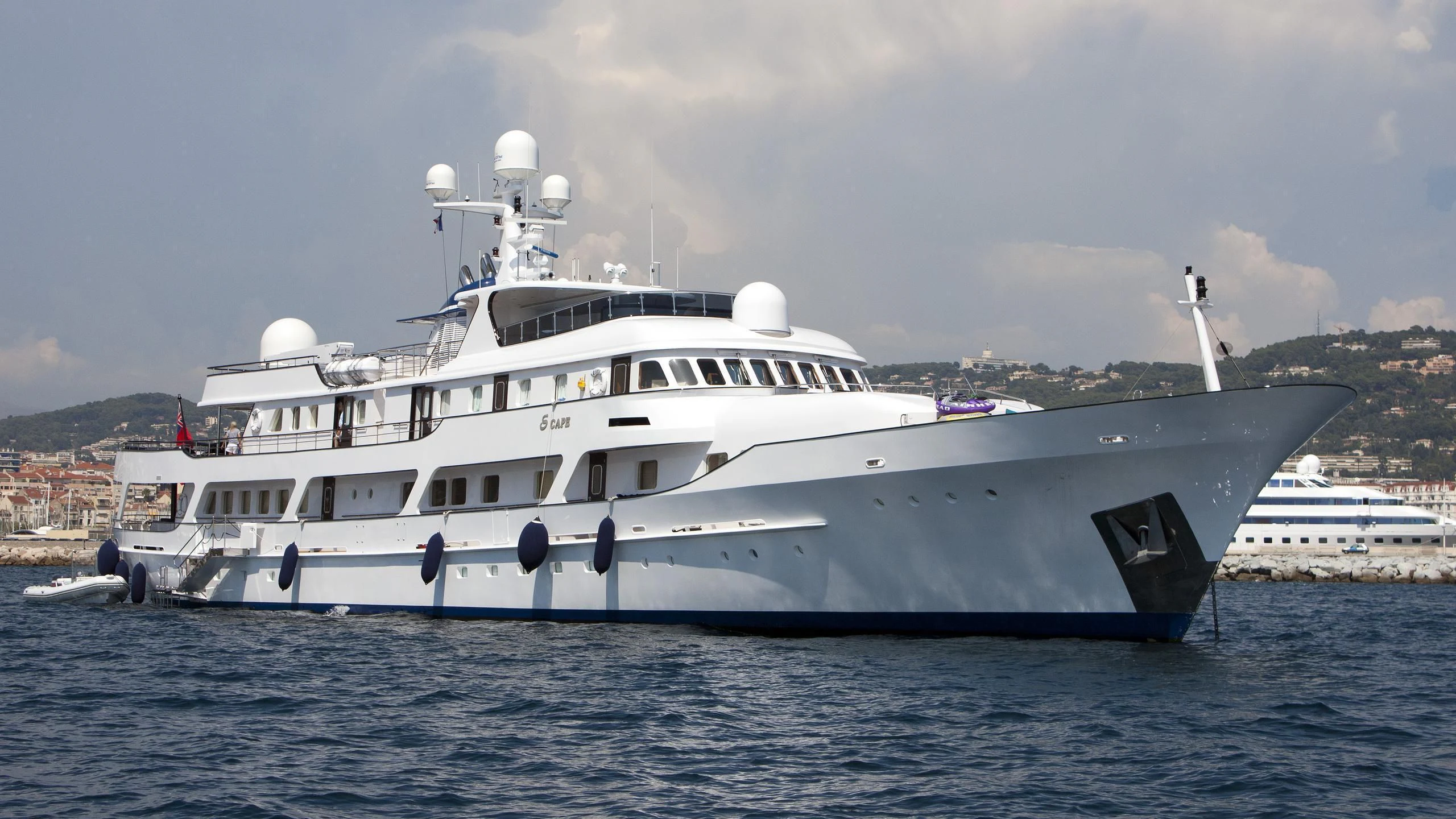 a large white boat in the water aboard MESERRET II Yacht for Sale