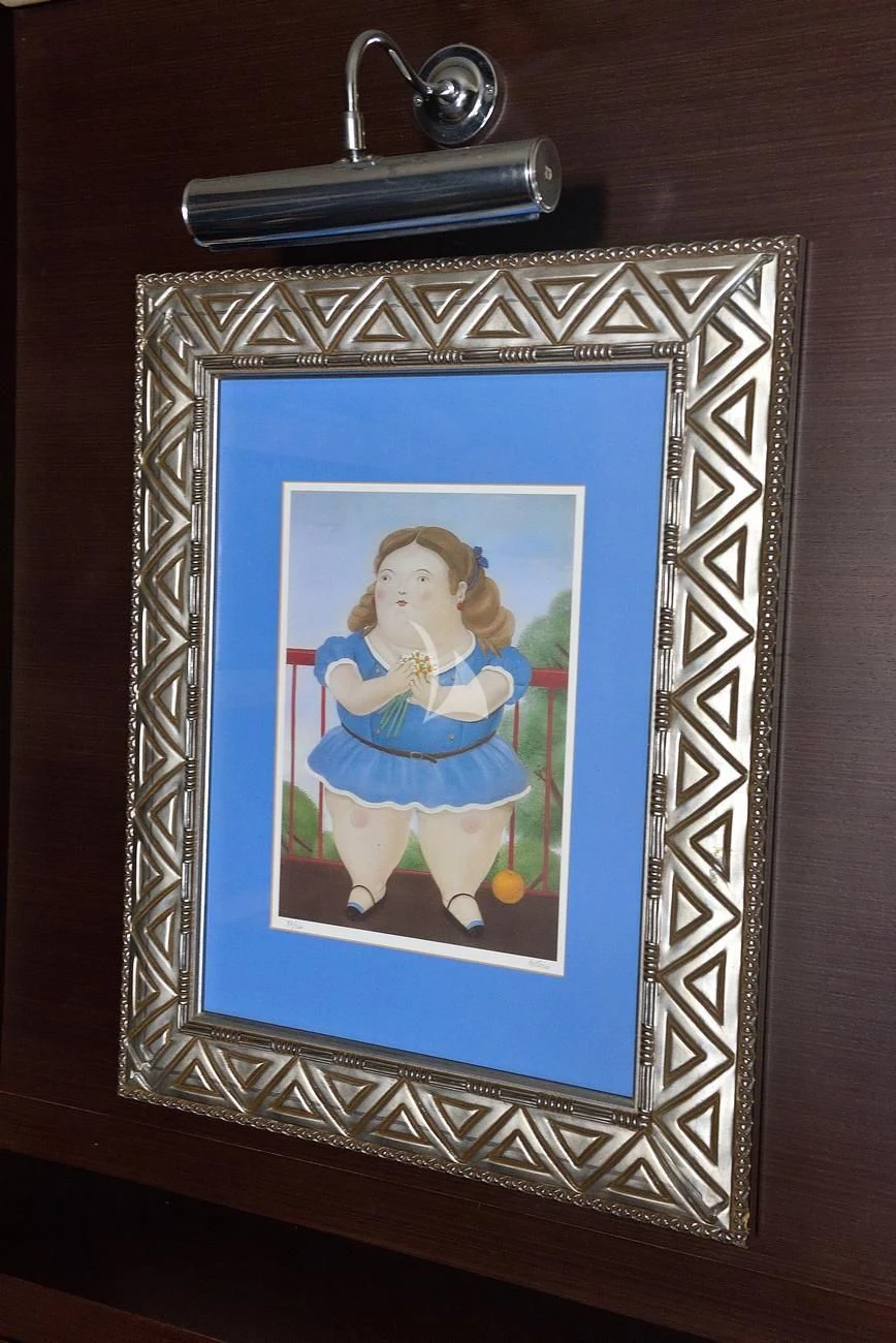 a framed picture of a girl aboard ANDEA Yacht for Sale