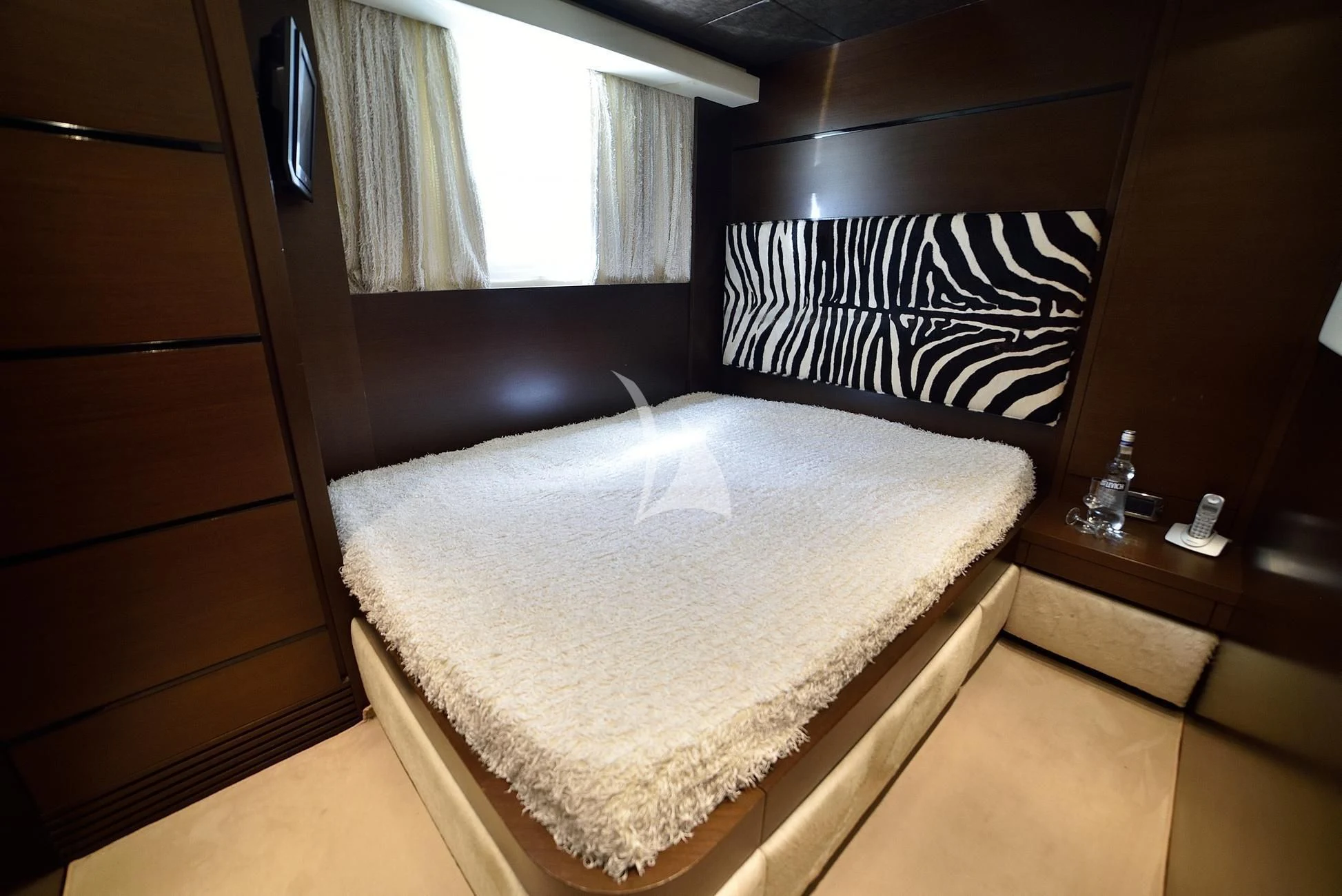 a bed with a white sheet aboard ANDEA Yacht for Sale