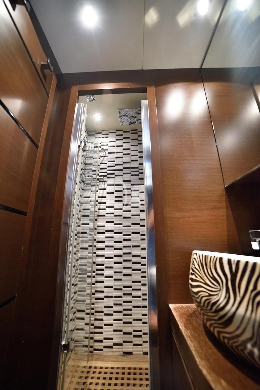 a tall stack of papers aboard ANDEA Yacht for Sale