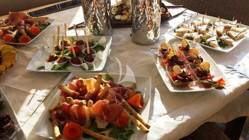a table full of food aboard ANDEA Yacht for Sale