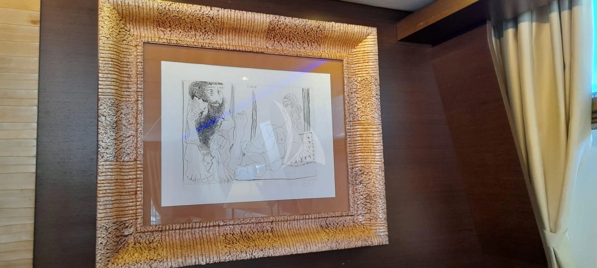 a framed picture on a table aboard ANDEA Yacht for Sale