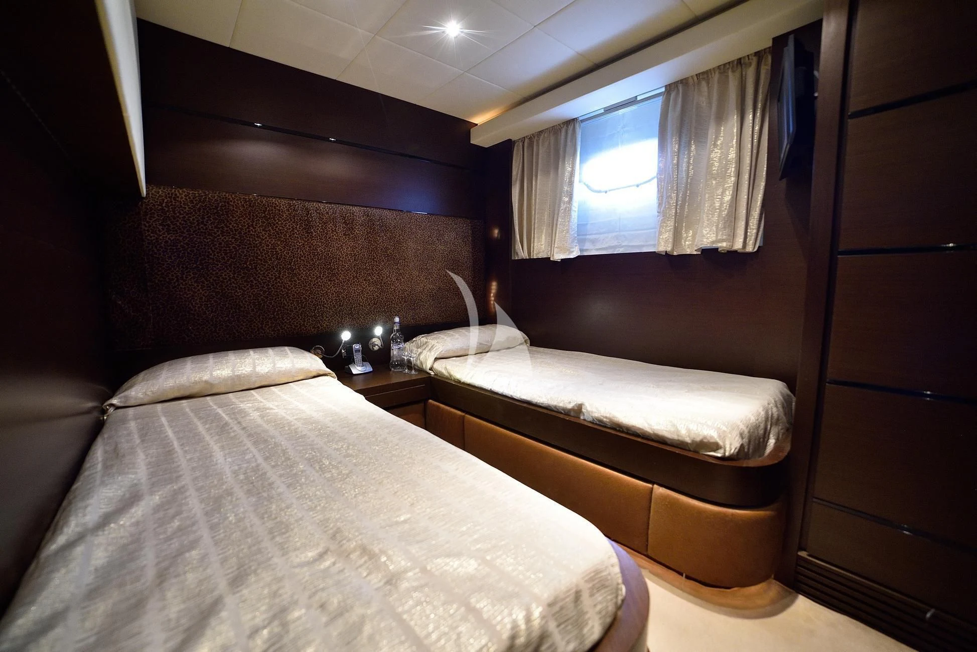 a room with two beds aboard ANDEA Yacht for Sale
