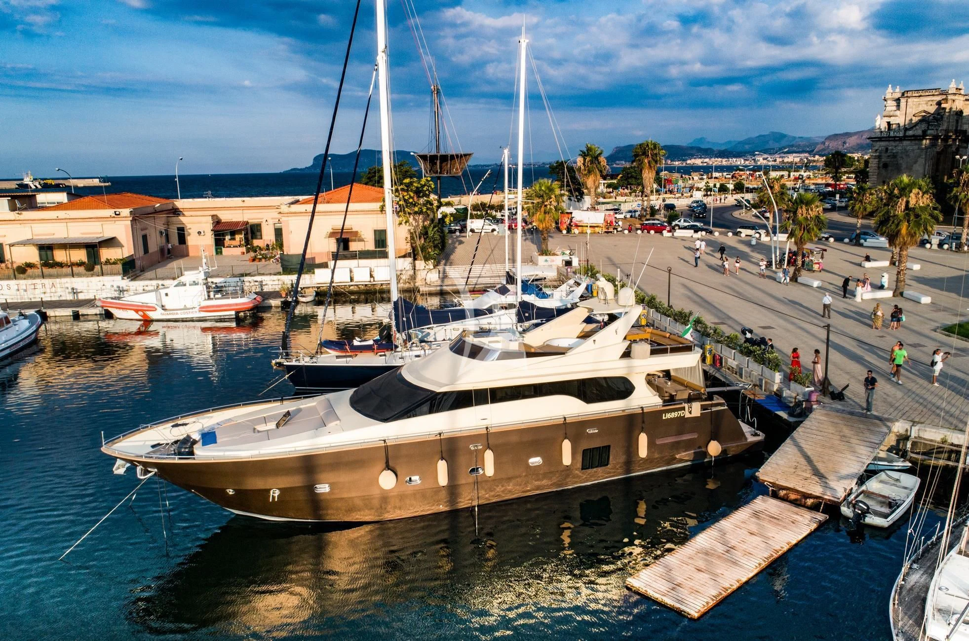 a boat docked at a pier aboard ANDEA Yacht for Sale