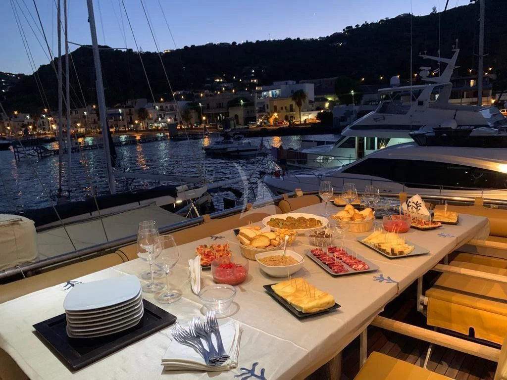 a table with food on it aboard ANDEA Yacht for Sale