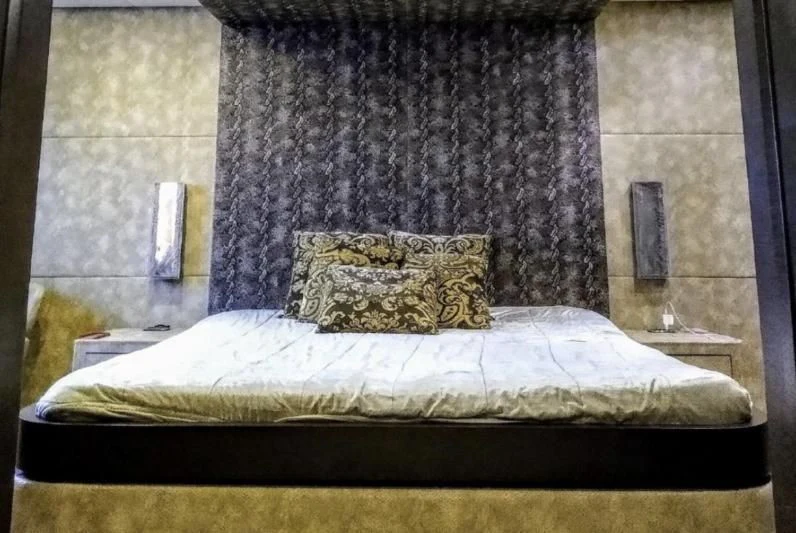 a bed with a pillow aboard ANDEA Yacht for Sale