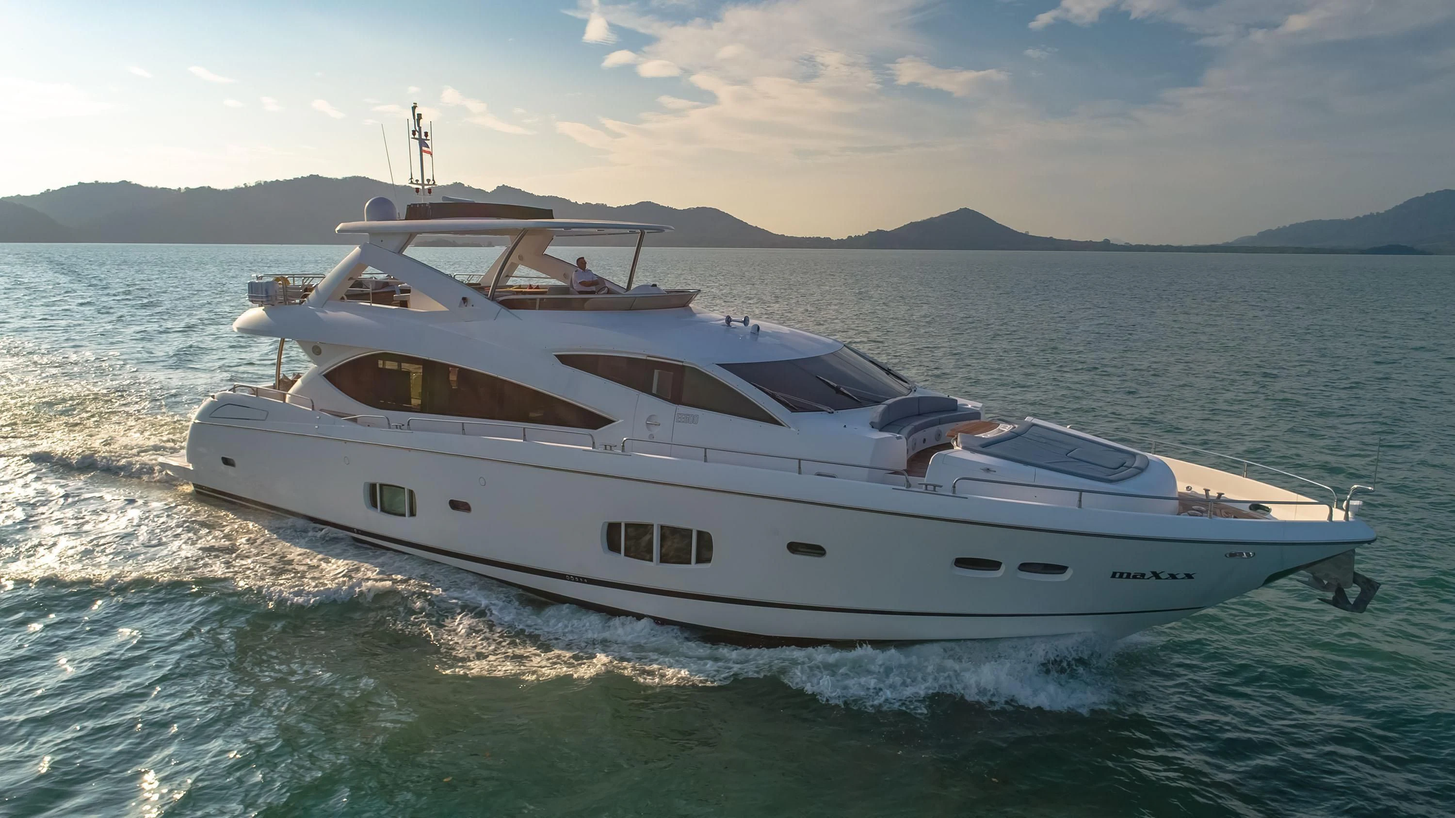 a white yacht on the water aboard ANDEA Yacht for Sale