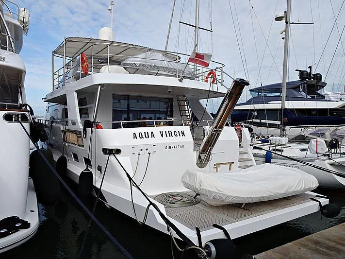 a boat docked at a pier aboard AQUA VIRGIN Yacht for Sale