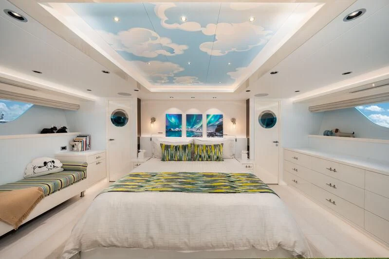 a room with a bed and a window aboard RING-N-WET Yacht for Sale