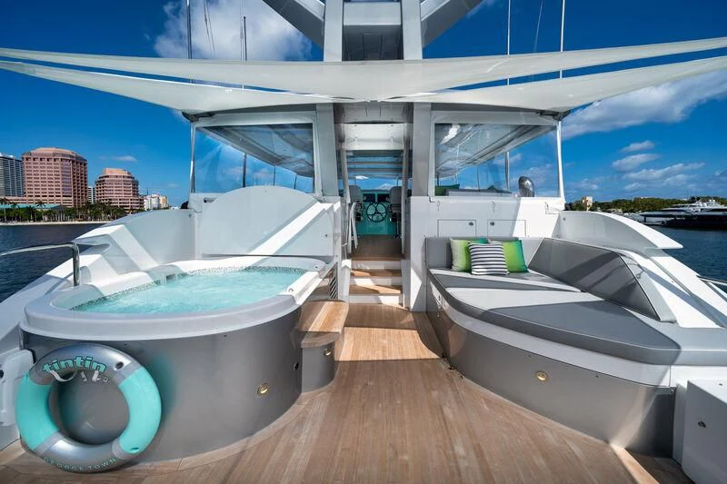 a large white boat on a dock aboard RING-N-WET Yacht for Sale