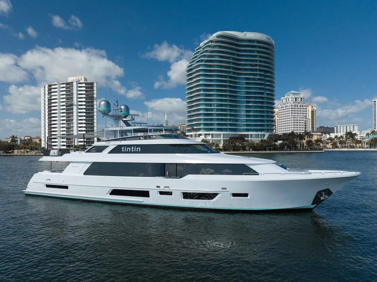 a white yacht in the water aboard RING-N-WET Yacht for Sale