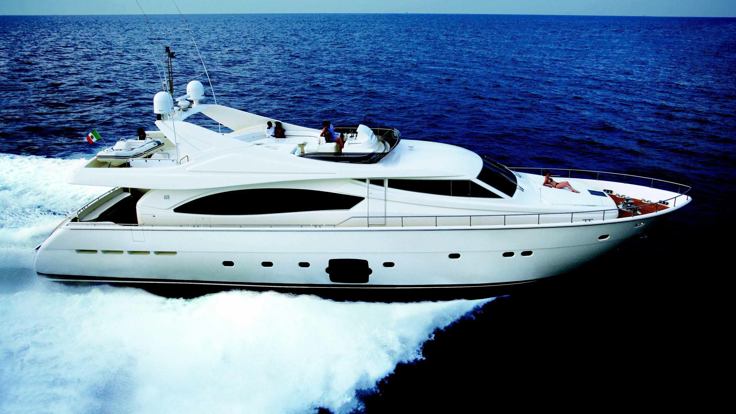 a white yacht on the water aboard S'VIDA Yacht for Sale