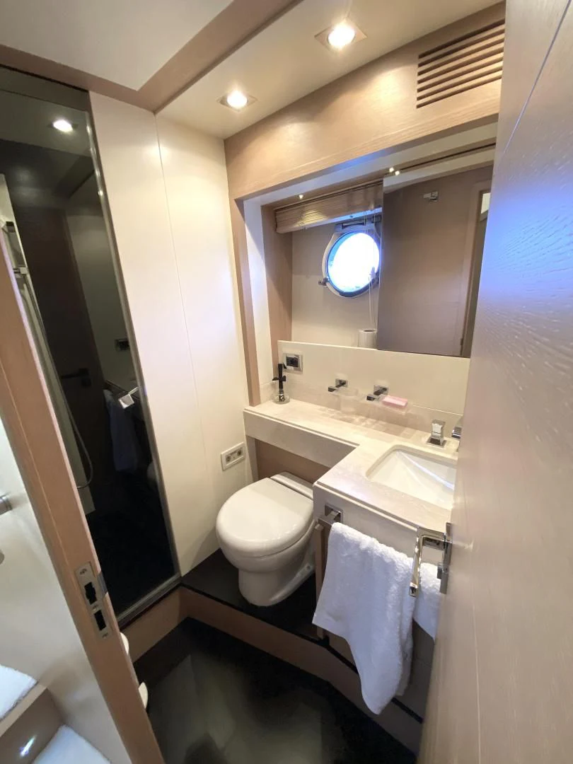 a bathroom with a sink and a toilet aboard THOR Yacht for Sale