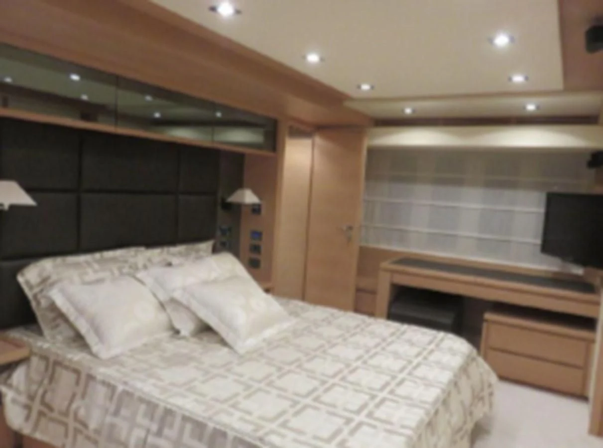 a bed with white sheets aboard THOR Yacht for Sale