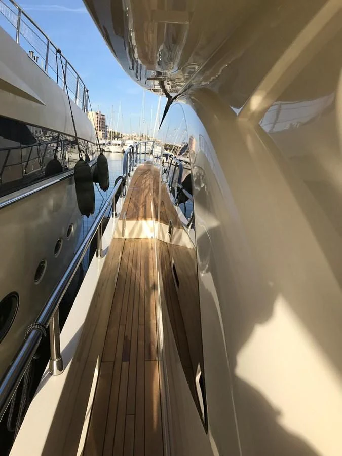 a person walking on a bridge aboard THOR Yacht for Sale