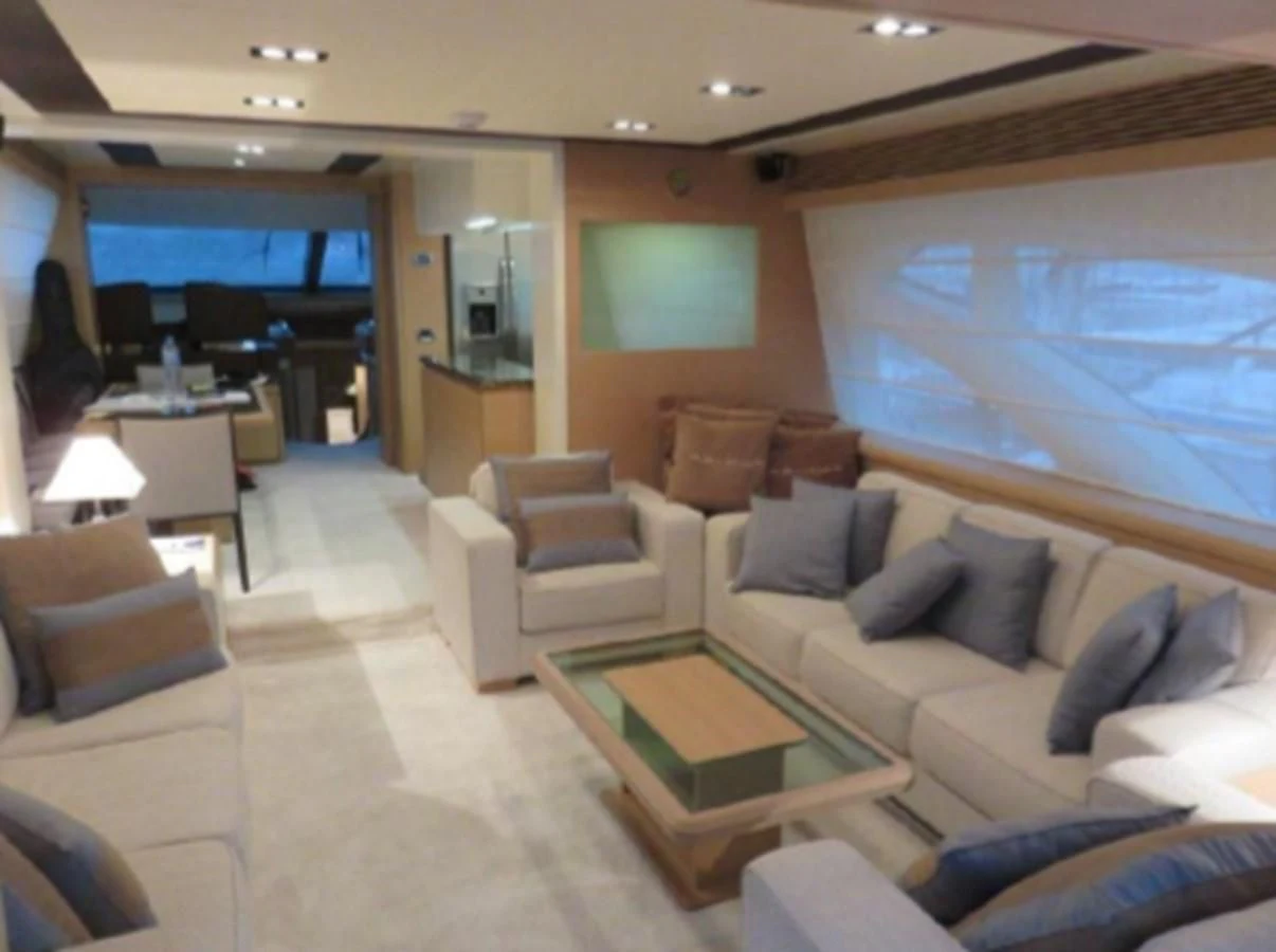 a living room with a large window aboard THOR Yacht for Sale
