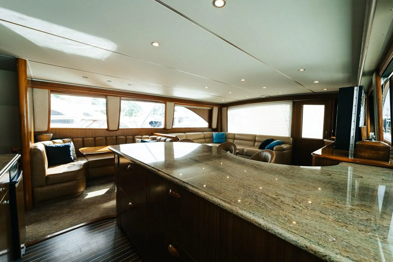 a large kitchen with a large island aboard RHINO FISH Yacht for Sale
