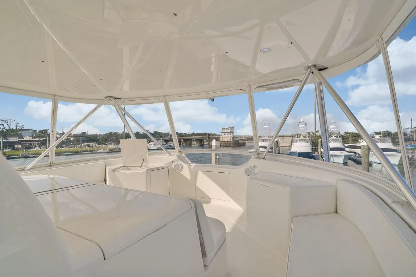 a boat with a large glass window aboard RHINO FISH Yacht for Sale