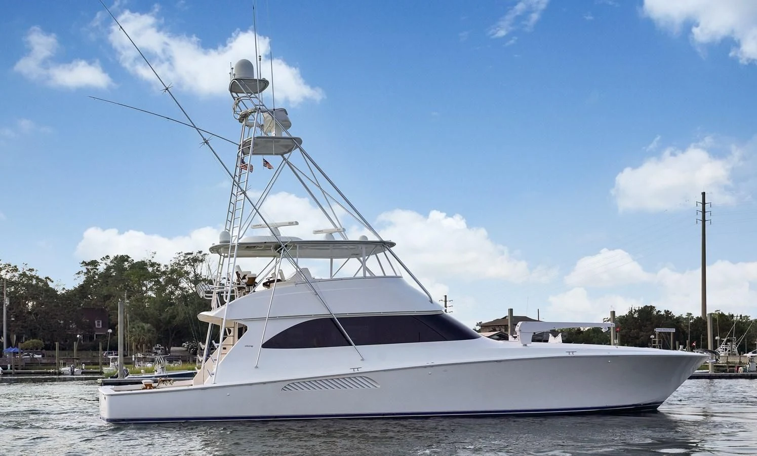 a white boat on the water aboard RHINO FISH Yacht for Sale
