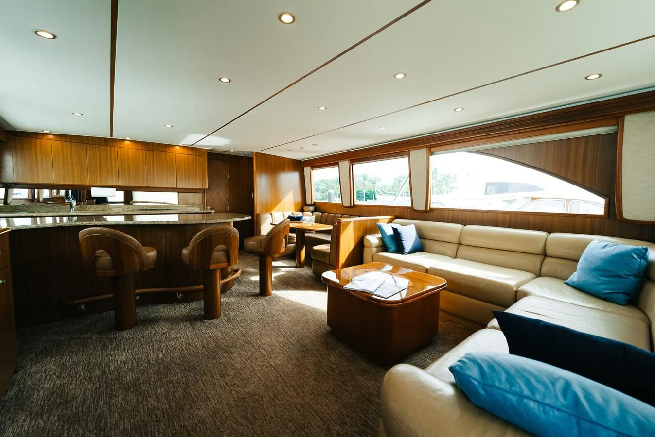a living room with a piano aboard RHINO FISH Yacht for Sale