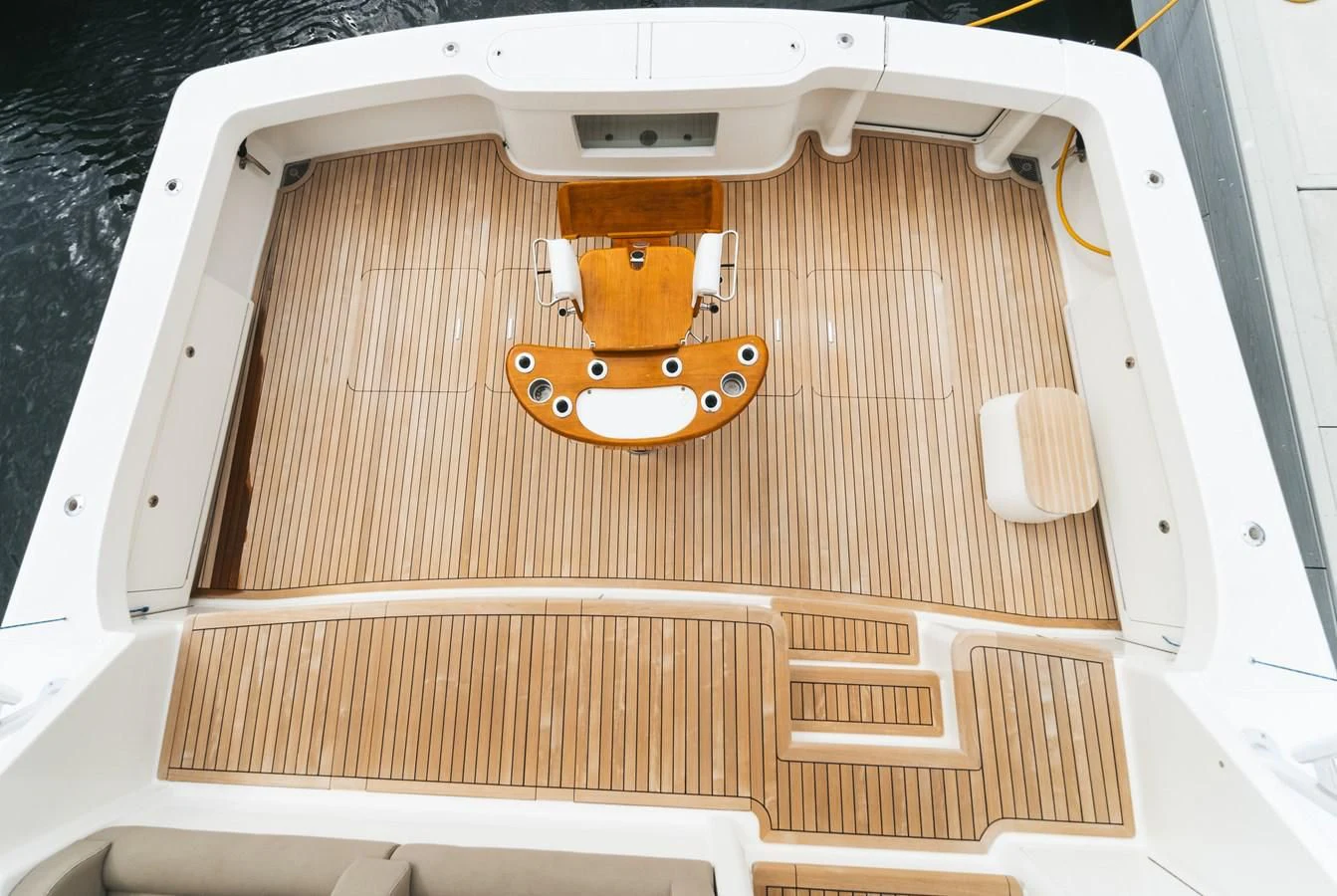 a wooden box with a small orange and black object inside aboard RHINO FISH Yacht for Sale