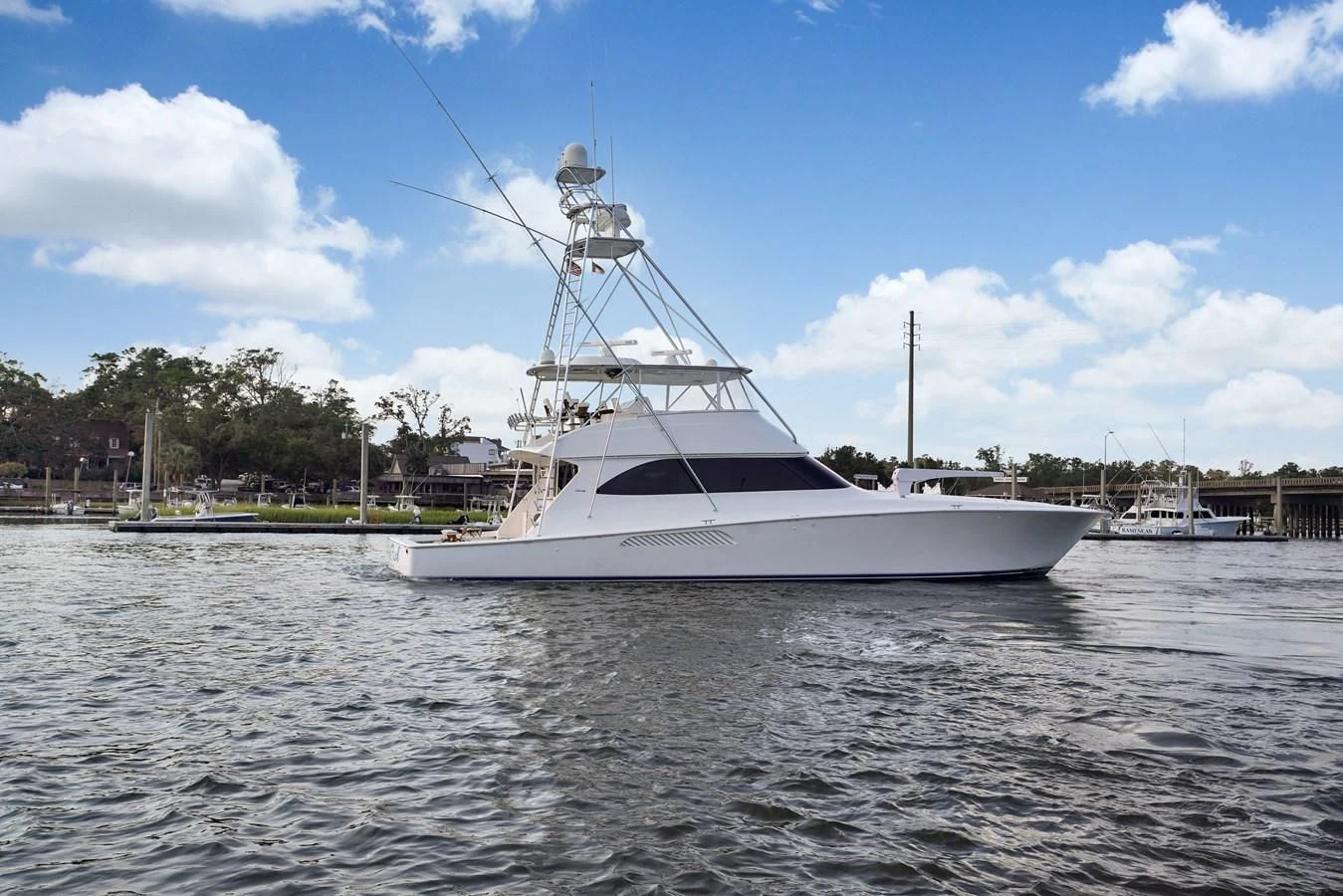 a white boat in the water aboard RHINO FISH Yacht for Sale