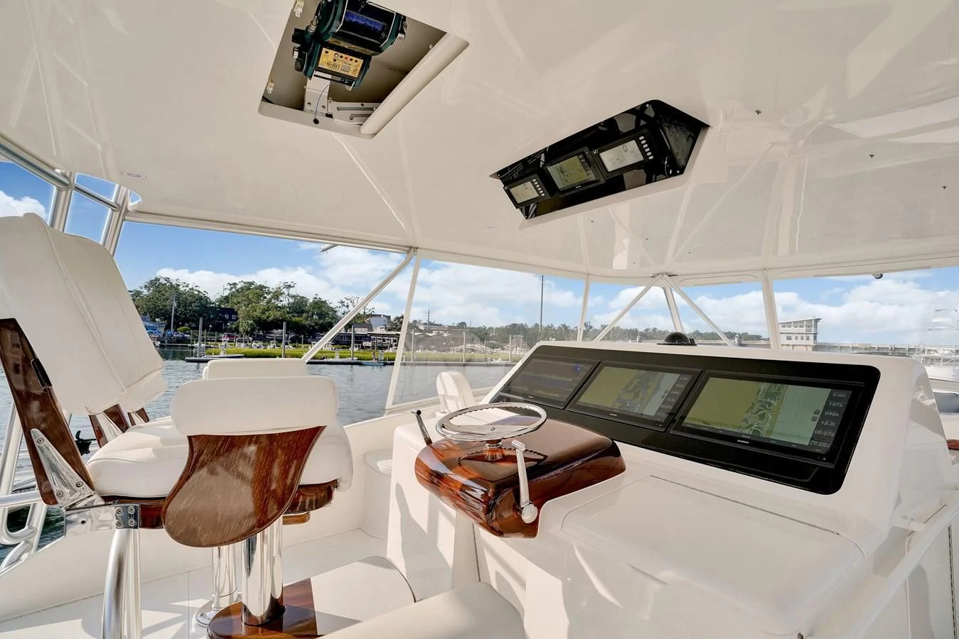 a room with a table and chairs aboard RHINO FISH Yacht for Sale