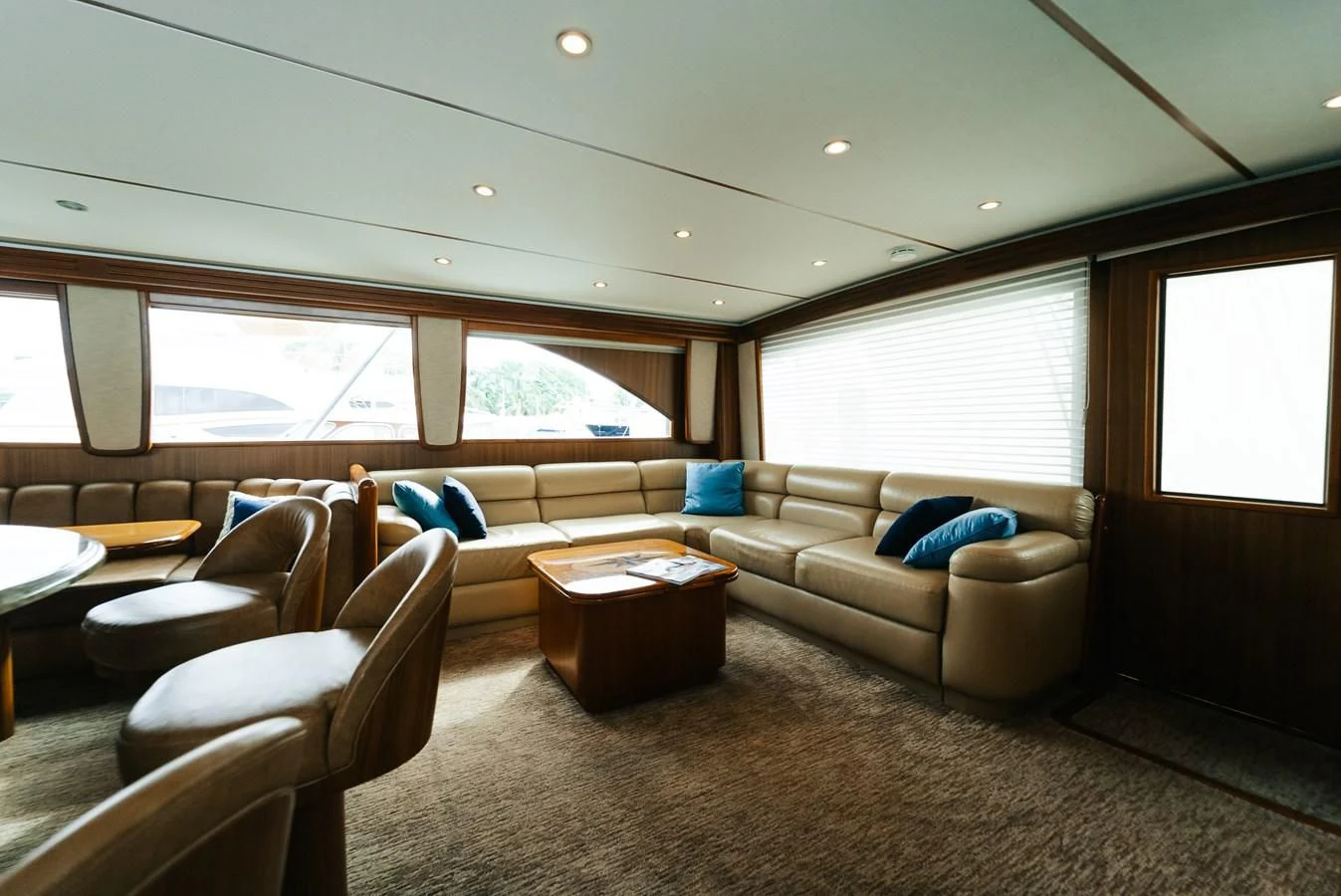 a living room with a couch and a table aboard RHINO FISH Yacht for Sale