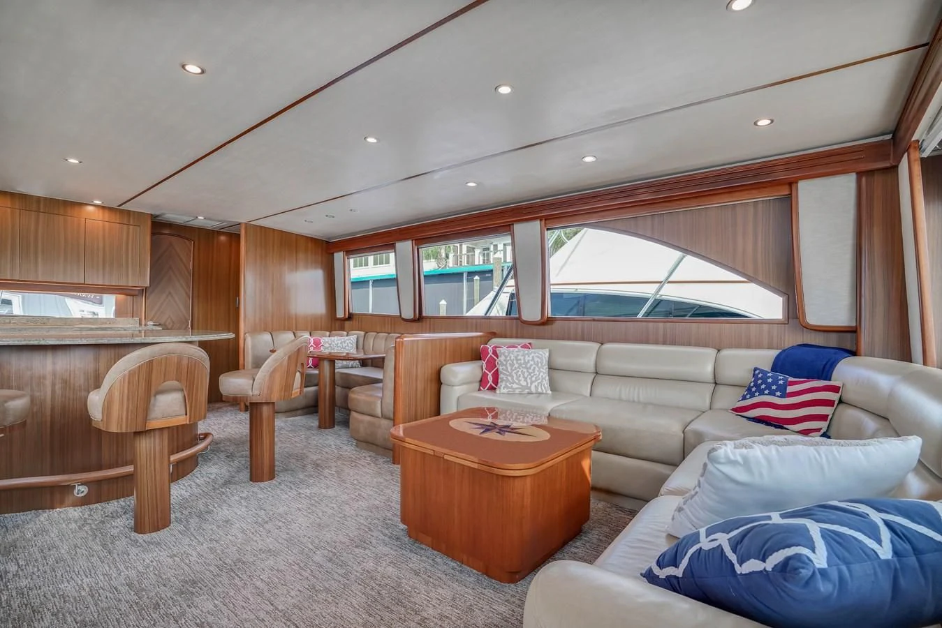 a living room with a couch and a table aboard RHINO FISH Yacht for Sale