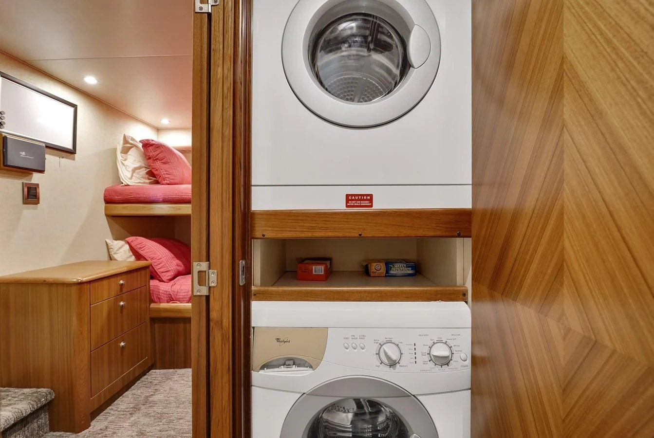a washer and dryer in a room aboard RHINO FISH Yacht for Sale