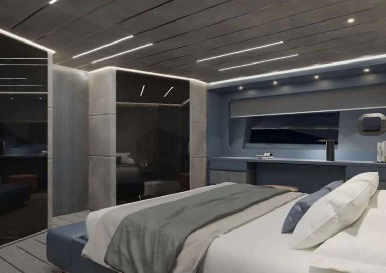 a room with a bed and a desk aboard 50 SHADES OF PLAY Yacht for Sale