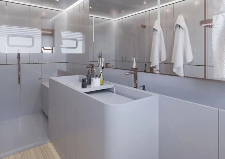 a bathroom with a sink and a mirror aboard 50 SHADES OF PLAY Yacht for Sale