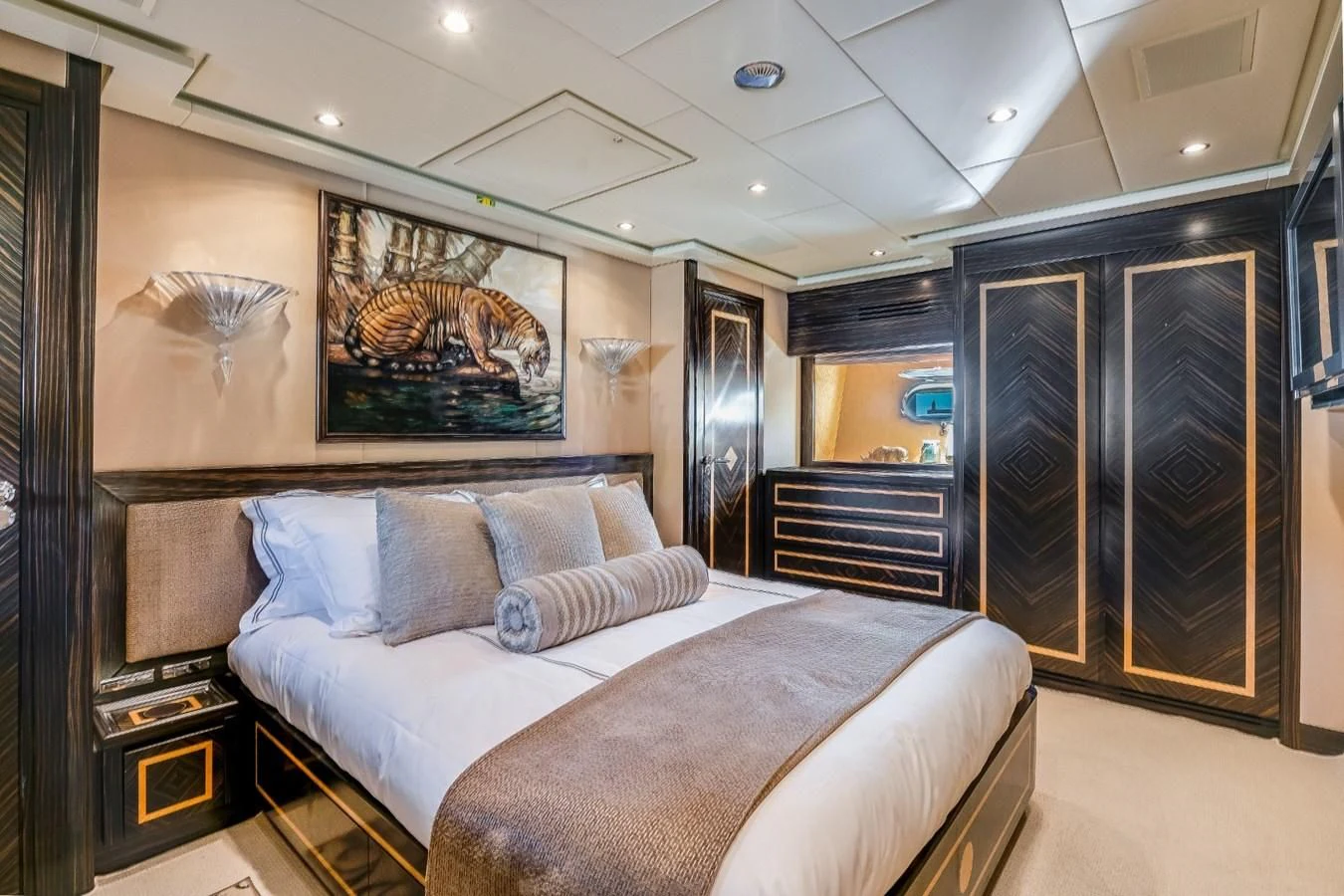 a bed in a room aboard ENCORE Yacht for Sale