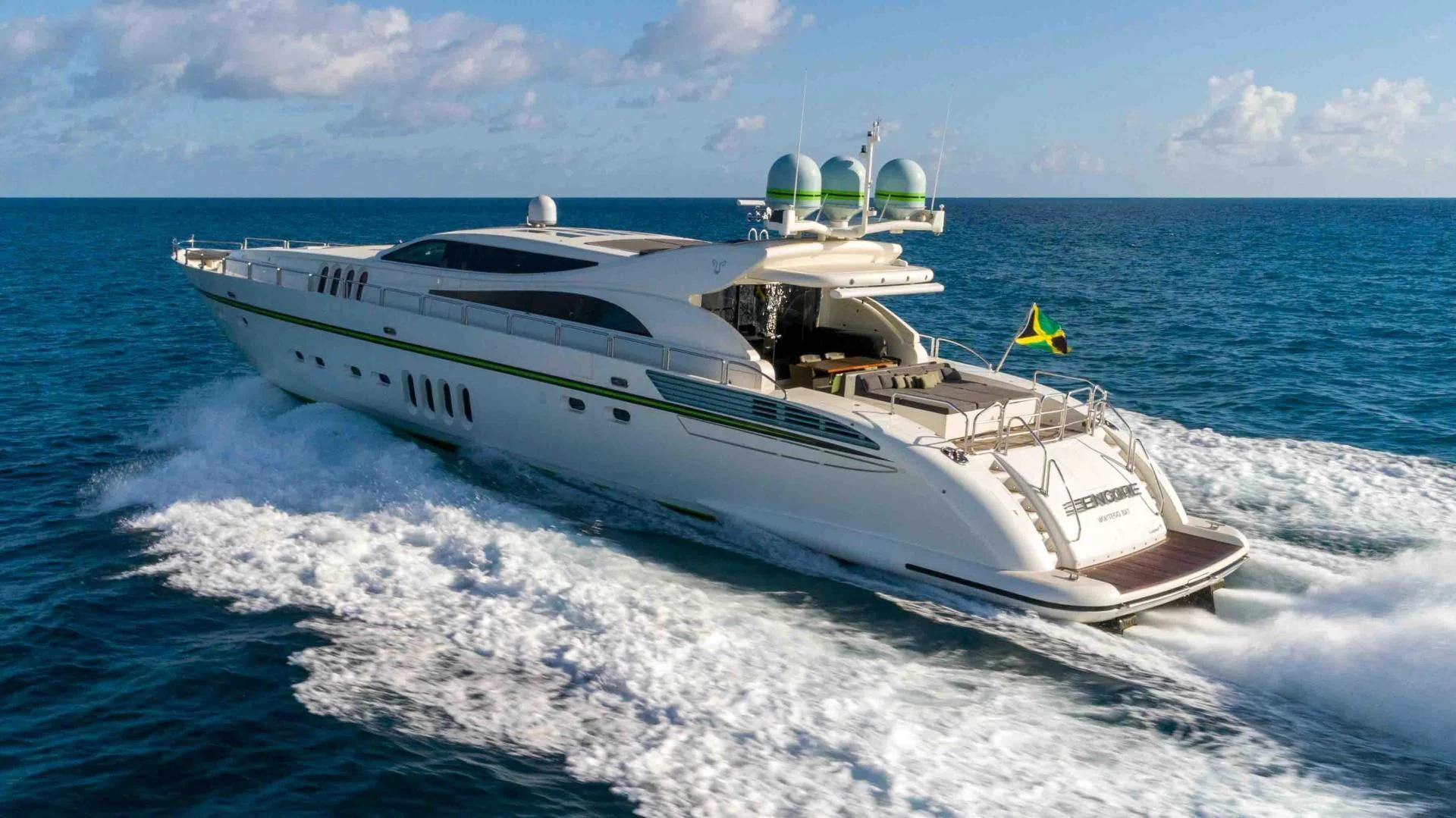 a white yacht on the water aboard ENCORE Yacht for Sale