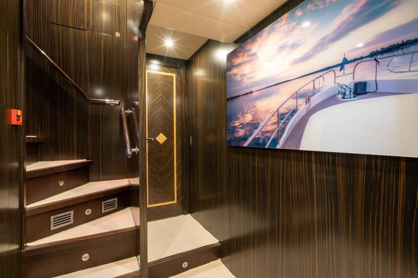 a room with a large glass wall aboard ENCORE Yacht for Sale
