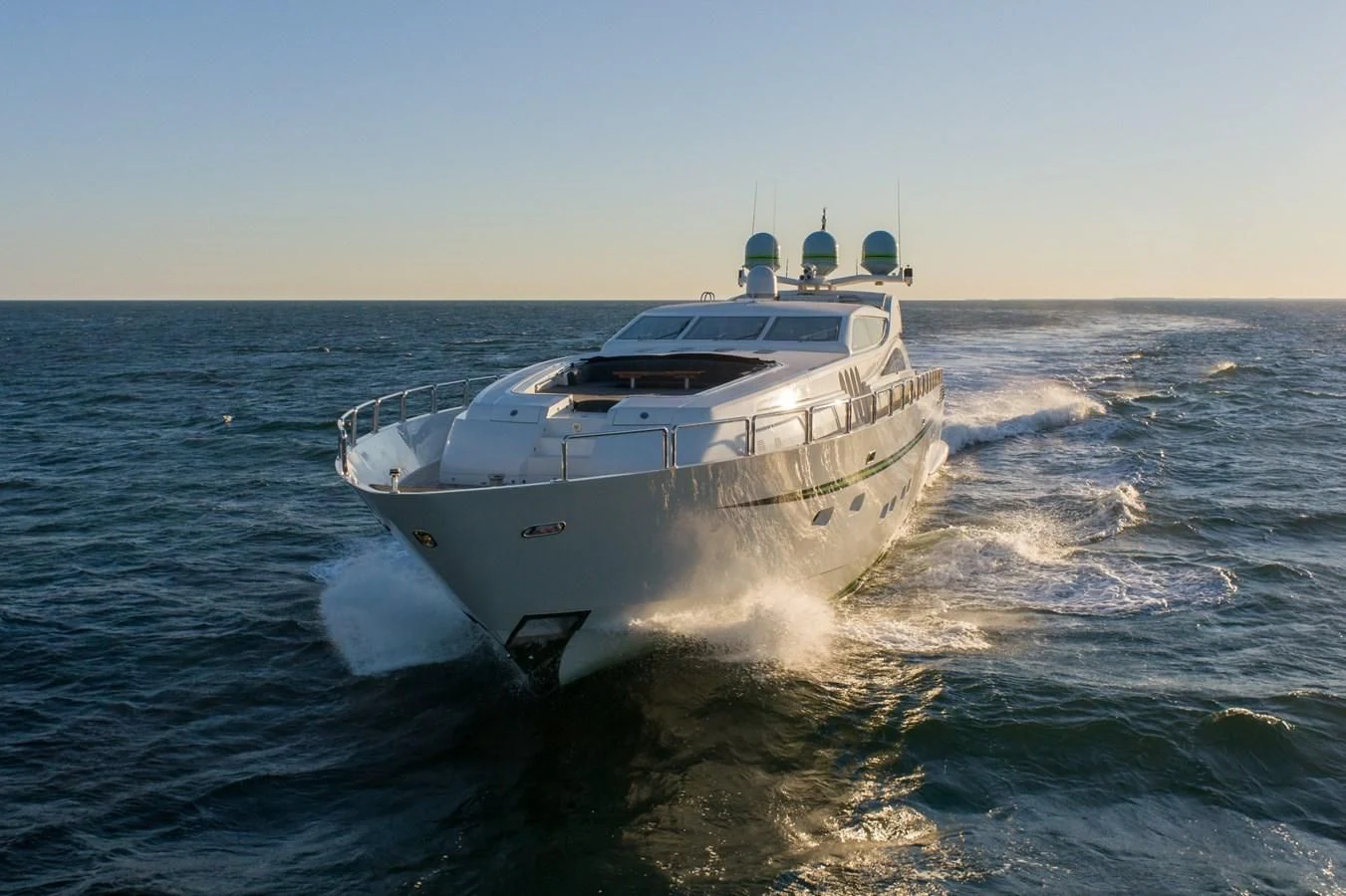 a white yacht on the water aboard ENCORE Yacht for Sale