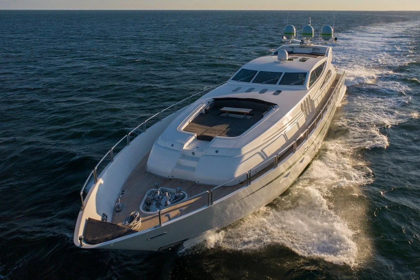 a white yacht on the water aboard ENCORE Yacht for Sale